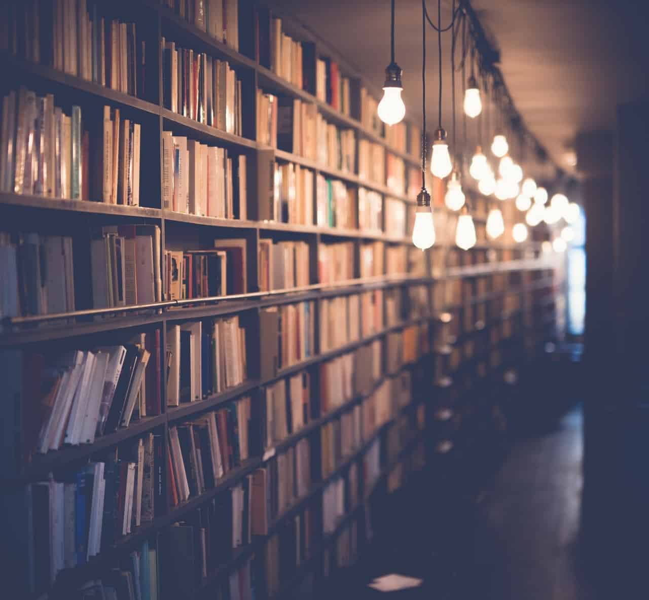 blur-book-stack-books-bookshelves