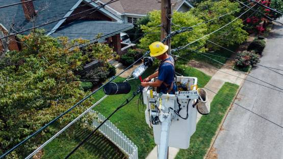 photography-of-man-repairing-electrical-wires