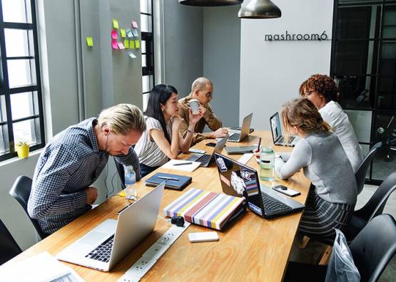 Millennials working in a meeting room